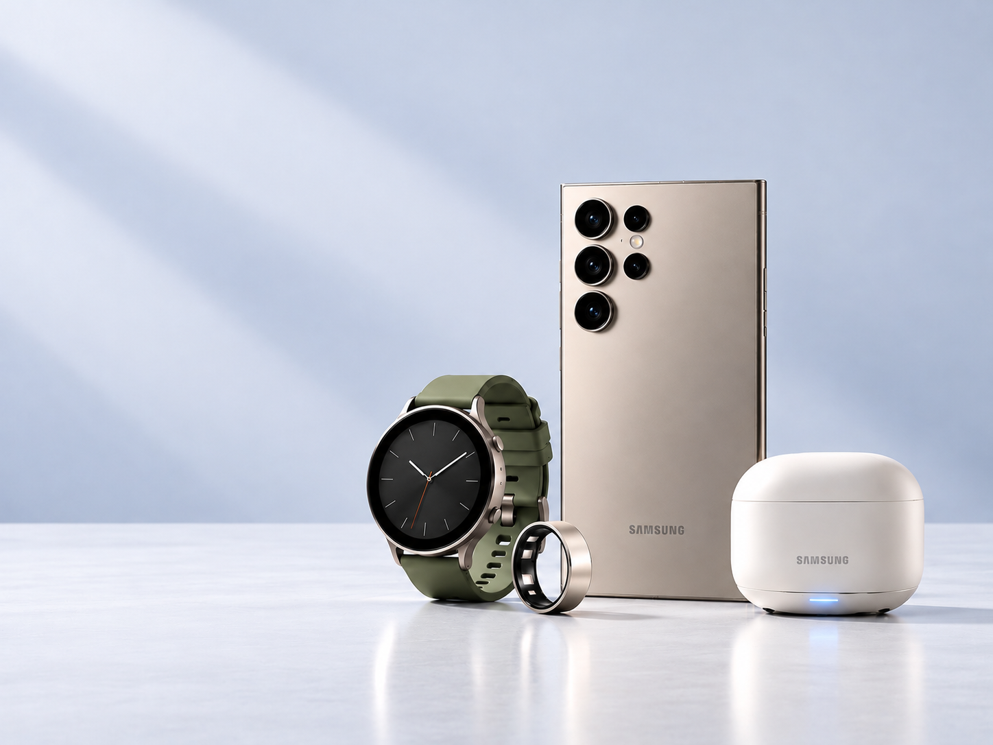 Samsung Galaxy phone, Watch, Ring and Buds on a white surface